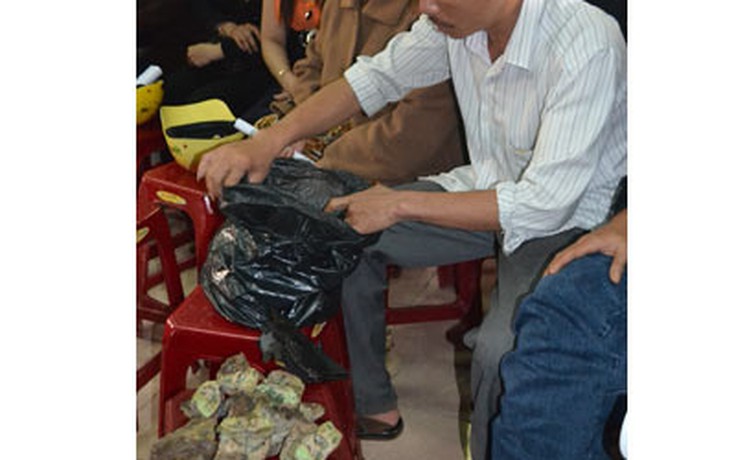 Nhiều tiểu thương chợ Quảng Ngãi chưa đổi được tiền bị cháy